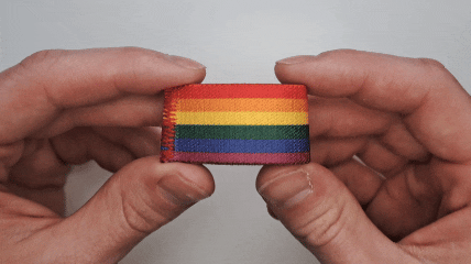 Dual-sided Squote Chest Strap Keepers securely attached to skydiving straps, showcasing premium quality and secure fit.